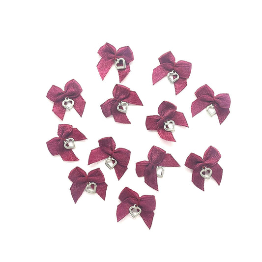 24 x Bow & heart charm