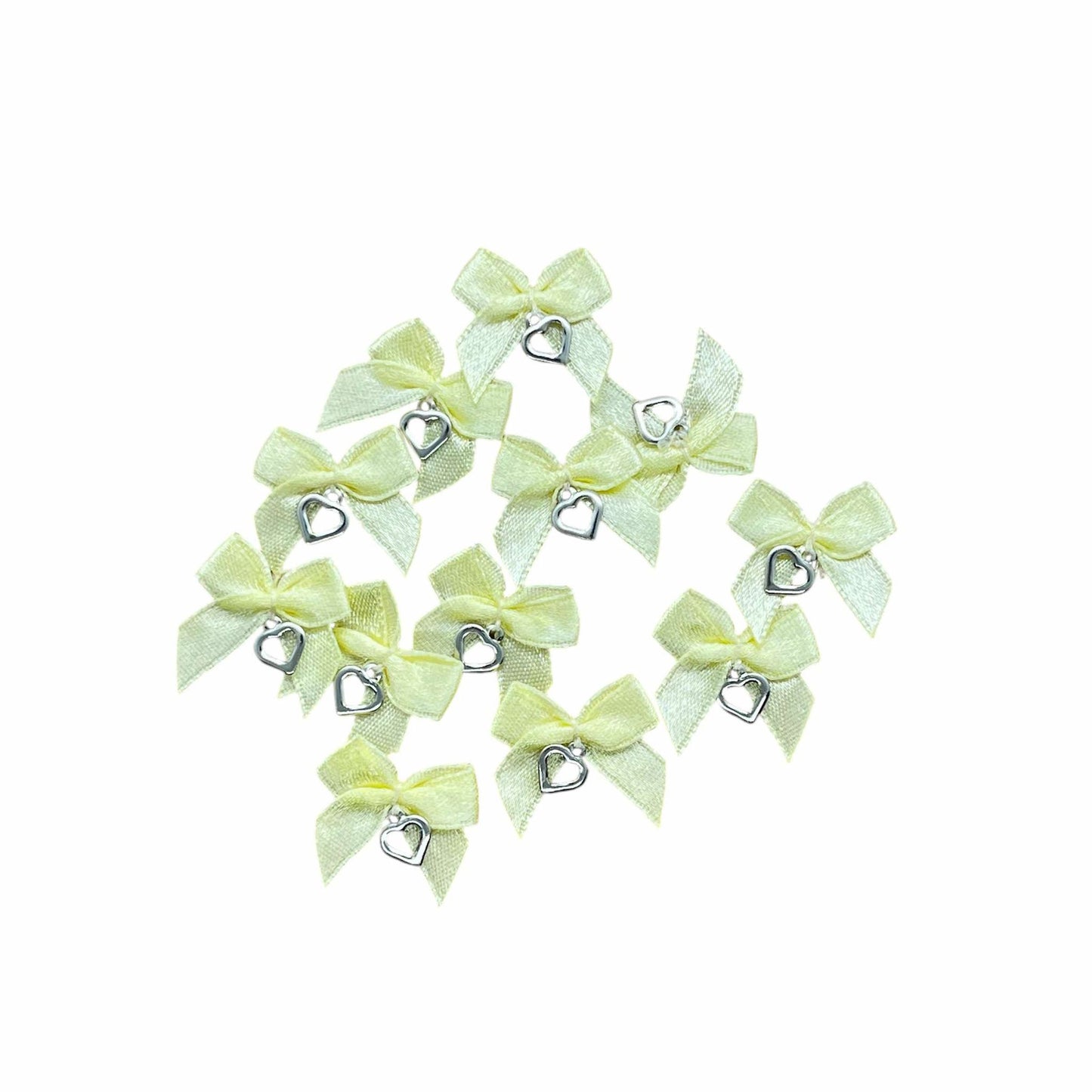 24 x Bow & heart charm