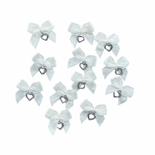 24 x White bow & heart charm image 0