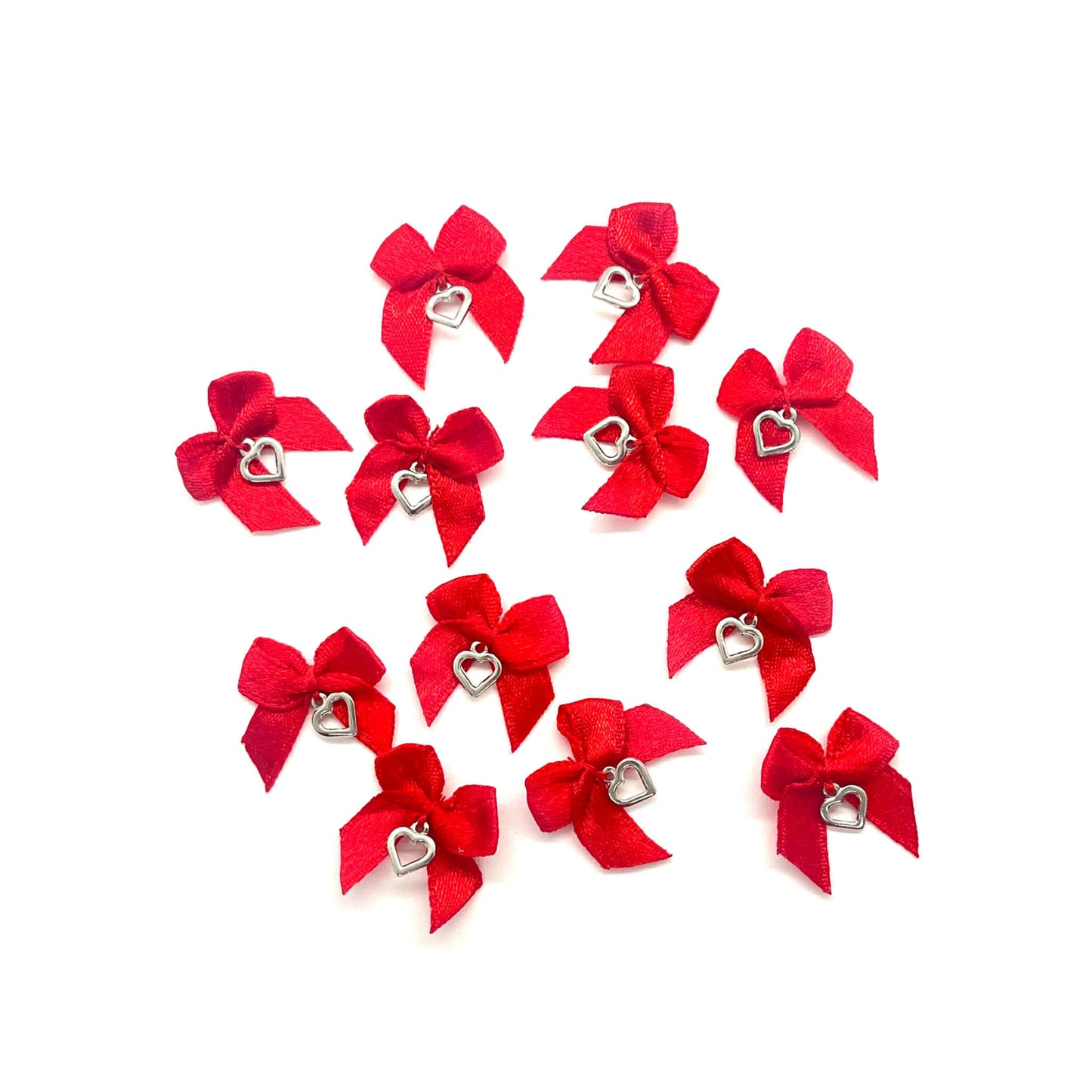 24 x Bow & heart charm